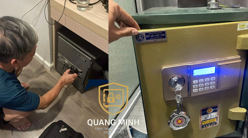 Bên trái người đàn ông cúi bên két nhỏ đặt dưới gầm bàn, bên phải két vàng có màn hình xanh và chìa cắm sẵn trong ổ